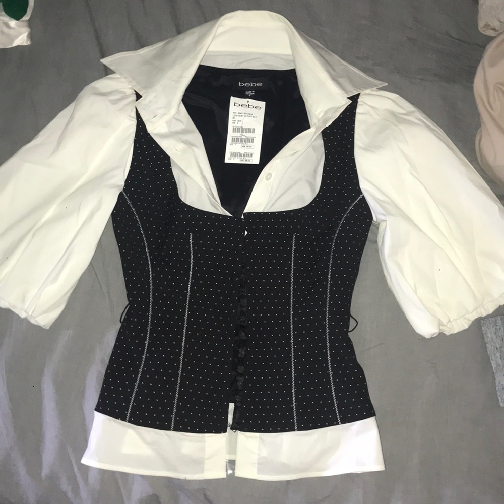BEBE polka dot blouse new with tag